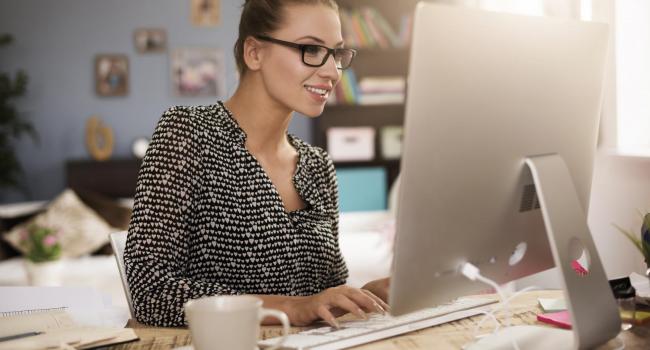 young-woman-in-front-of-her-computer